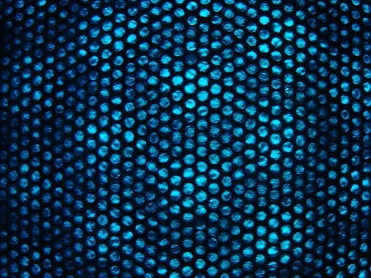 a close up view of a cell phone screen, a microscopic photo, by Jon Coffelt, deviantart, kinetic pointillism, blue headlights, fabric texture, modern high sharpness photo, trypophobia