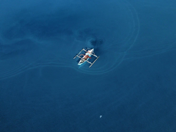 an overhead view of a large blue ocean