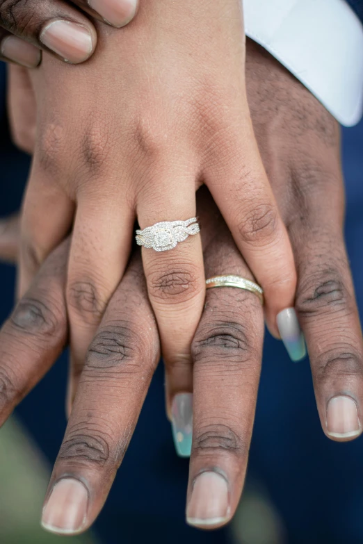 a close up of a person holding a wedding ring, varying ethnicities, slide show, couple, thumbnail