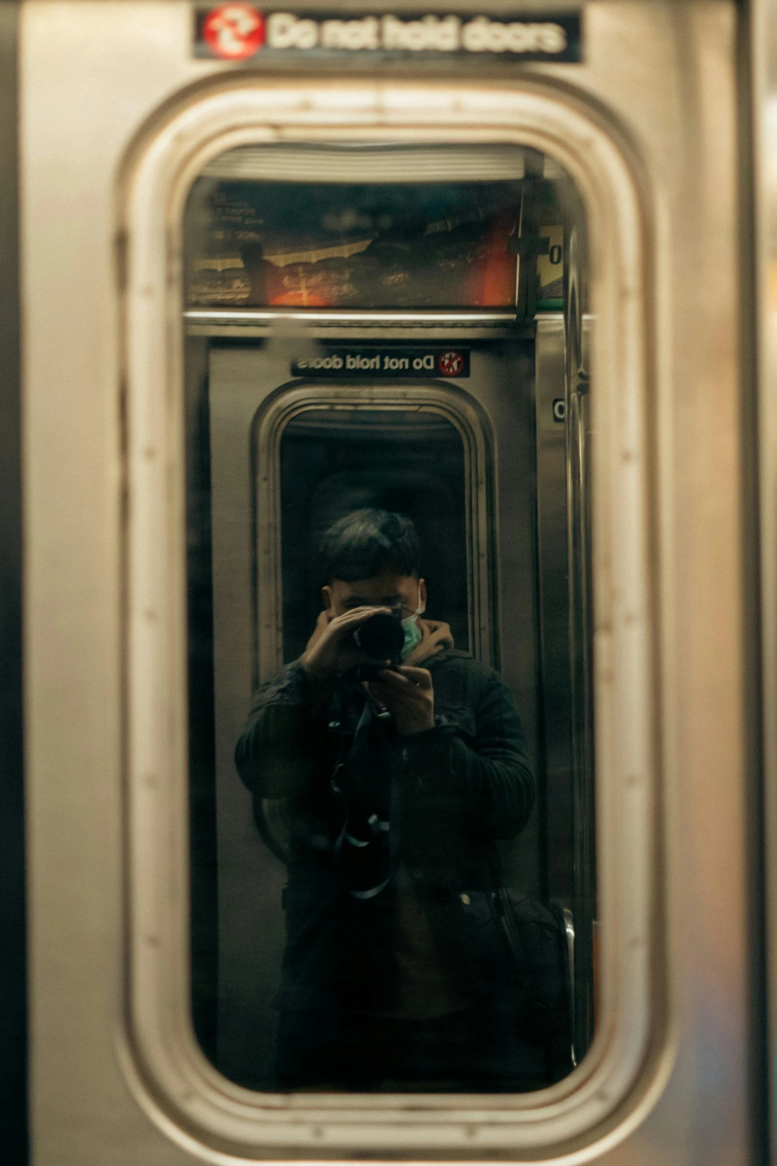 a person taking a po on a subway train