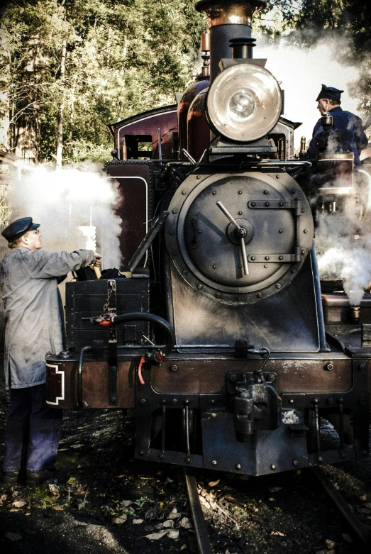 a man standing next to a train with steam coming out of it, historically accurate, sydney, working hard, thumbnail