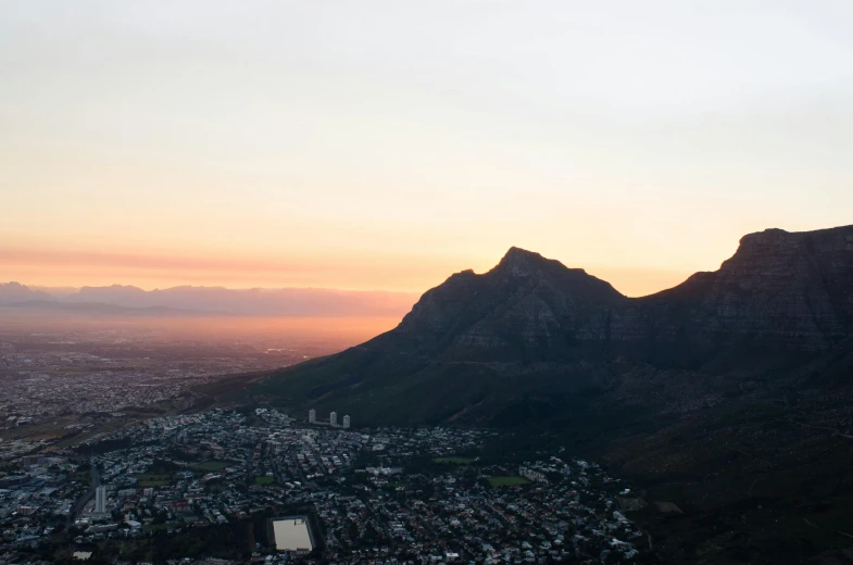 a view of a city from the top of a mountain, pexels contest winner, landscape of africa, last light on mountain top, 2 0 0 0's photo, fine art print