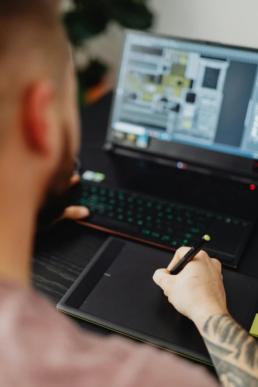 a man that is sitting in front of a laptop, a computer rendering, pexels contest winner, digitally draw on wacom tablet, schematic in a notebook, rtx geforce experience, top down drawing