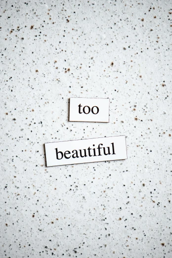 a piece of paper with the words too beautiful on it, by Tilo Baumgärtel, trending on unsplash, concrete poetry, thin porcelain, two, 15081959 21121991 01012000 4k