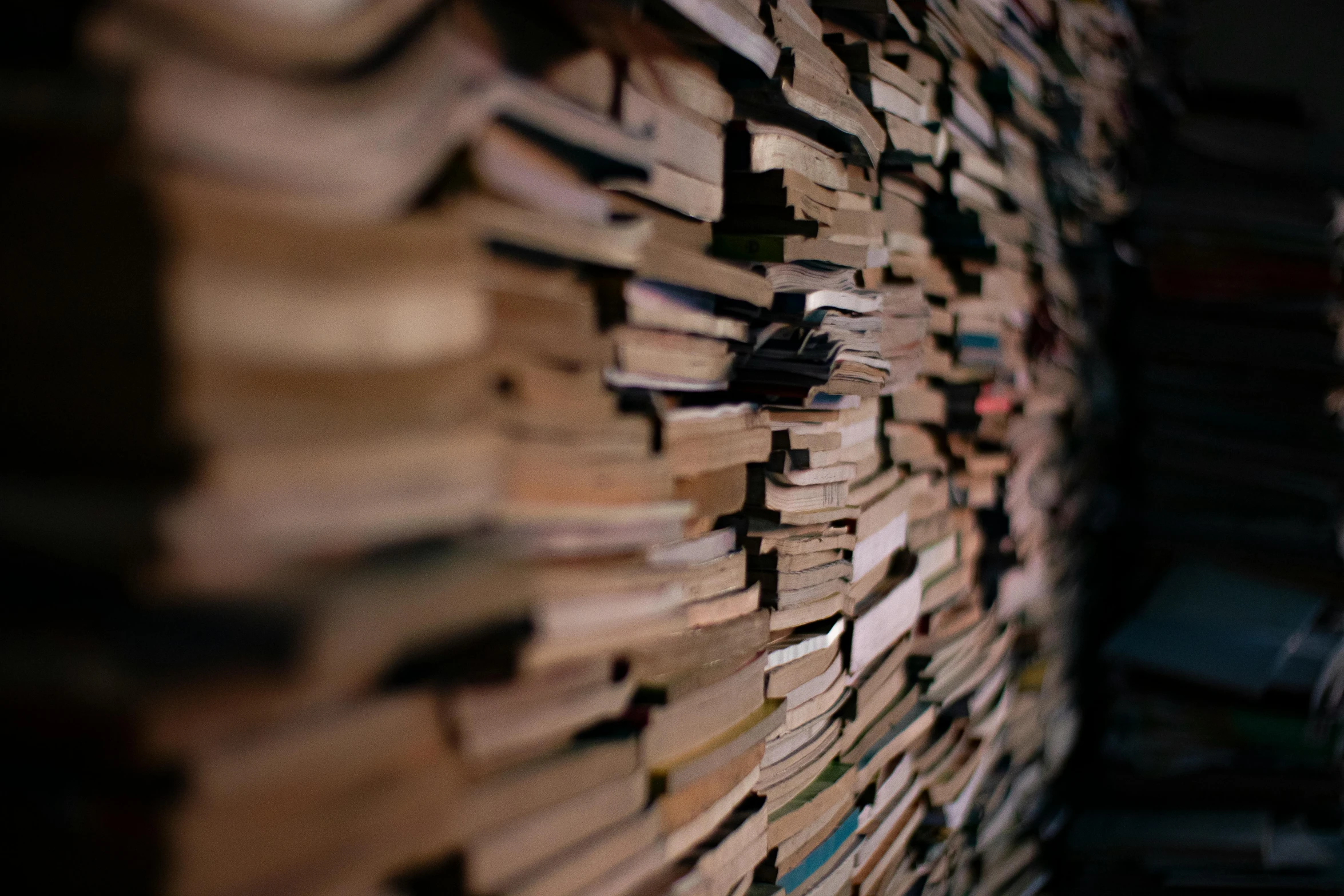 a bunch of books stacked on top of each other, by Daniel Lieske, pexels, conceptual art, passages, shot from cinematic, brown, 15081959 21121991 01012000 4k