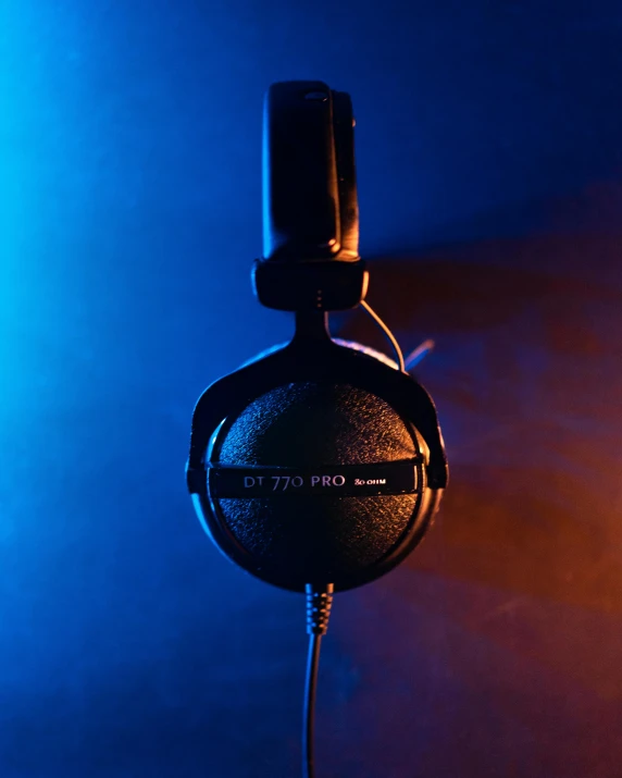 a pair of headphones sitting on top of a table, studio diffuse lights, thumbnail, dnd, profile image