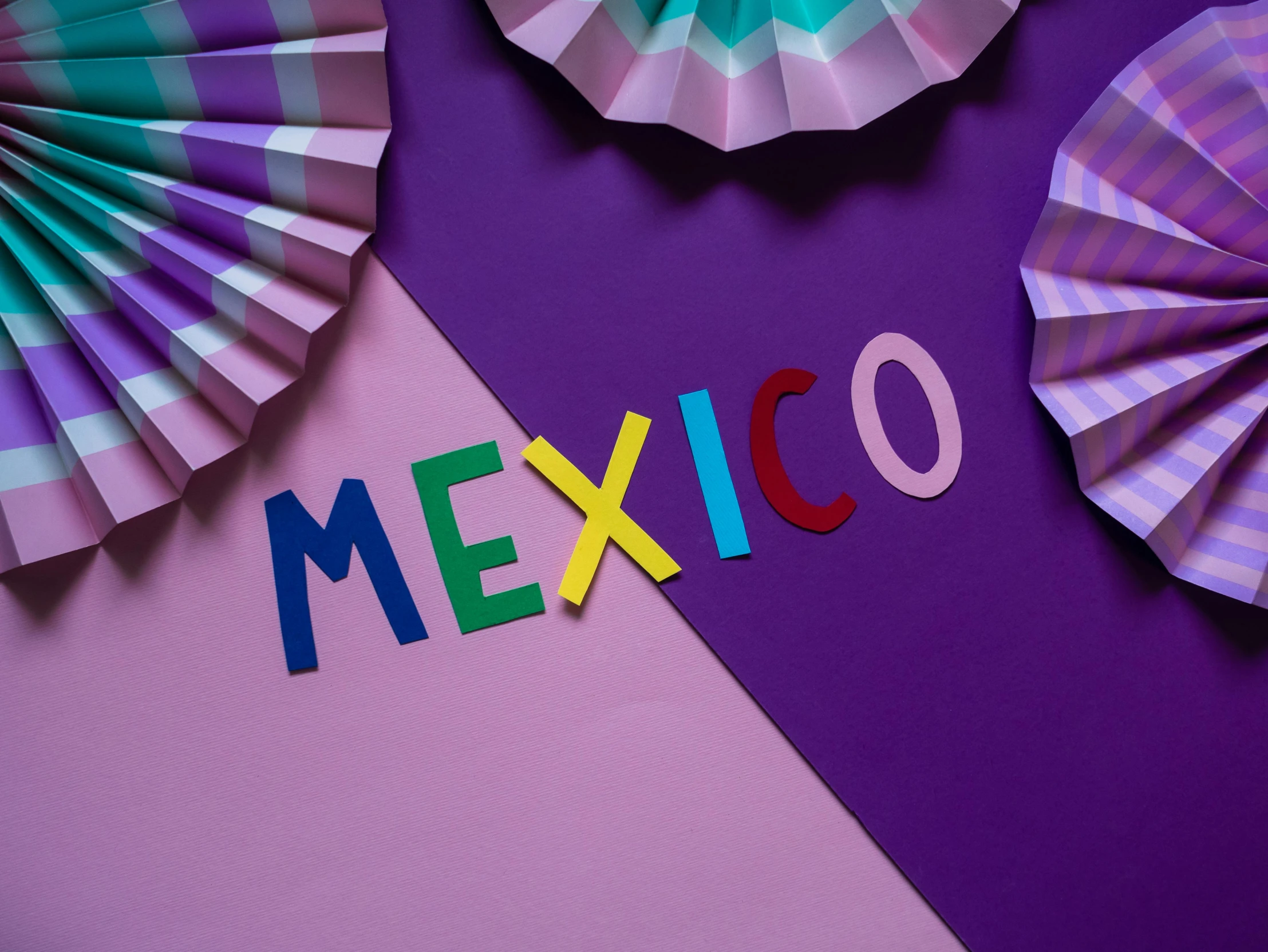 colorful paper fans with the word mexico on them, pexels contest winner, international typographic style, ((purple)), twice, teaser, papercraft