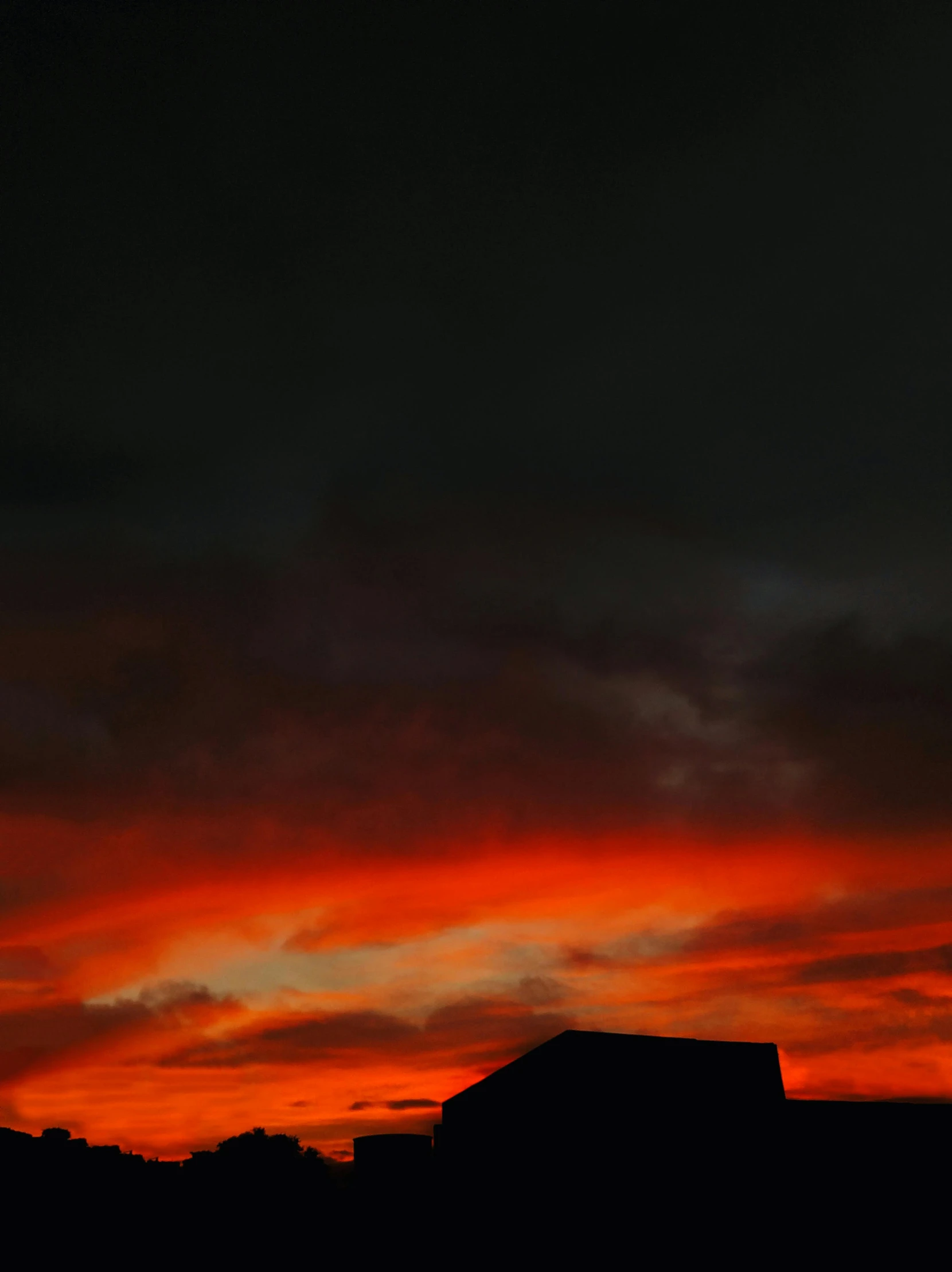 the sky is red and orange as the sun sets, by Jan Tengnagel, pexels contest winner, red on black, shot from roofline, stormy setting, today\'s featured photograph 4k
