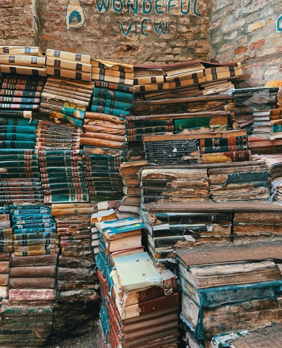 a pile of books stacked on top of each other, an album cover, trending on unsplash, analytical art, shelves full of medieval goods, dressed in a worn, lgbtq, no watermarks