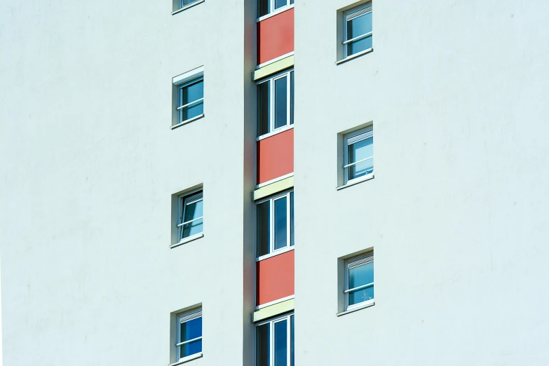 a tall building that has several windows in it