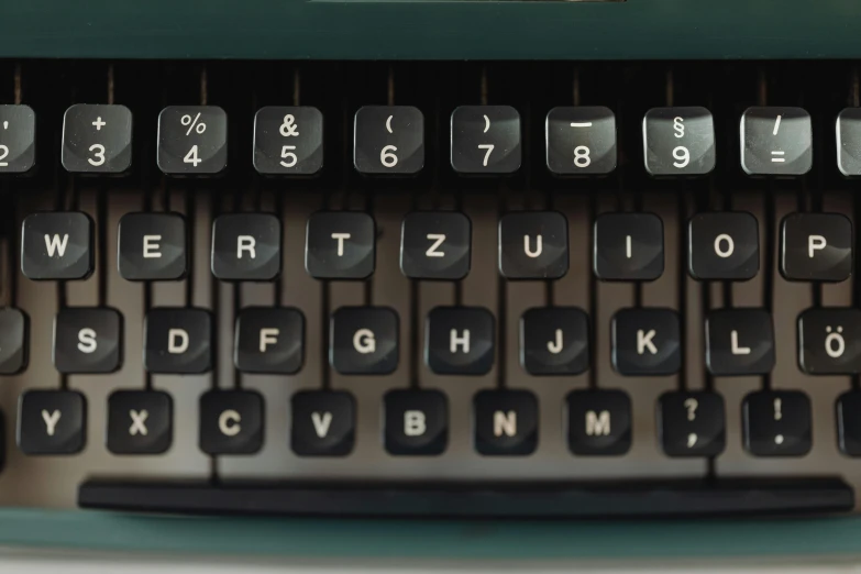 a close up of an old typewriter keyboard, by Carey Morris, unsplash, private press, multiple stories, seventies, fine details 8k octane rendering, mint