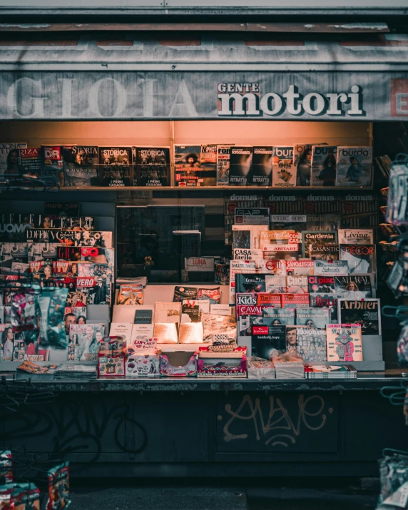 a shop front is seen filled with books