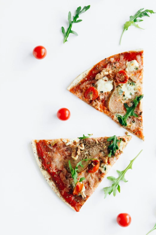 a couple of slices of pizza sitting on top of a table, by Andries Stock, pexels contest winner, white background, 2 5 6 x 2 5 6, organic, cosmopolitan