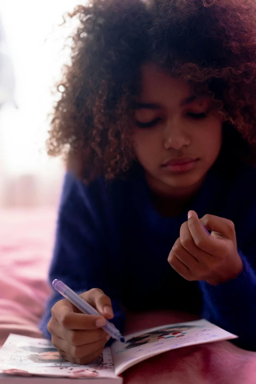 a little girl laying on a bed reading a book, by artist, pexels, visual art, black teenage boy, writing on a clipboard, video still, purple