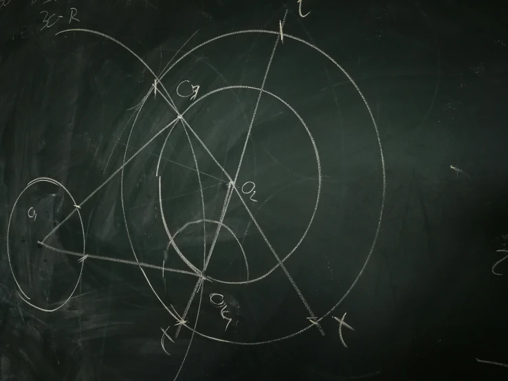 a blackboard with a drawing of a circle on it, pexels, analytical art, pentacle, background image, balancing the equation, set photo