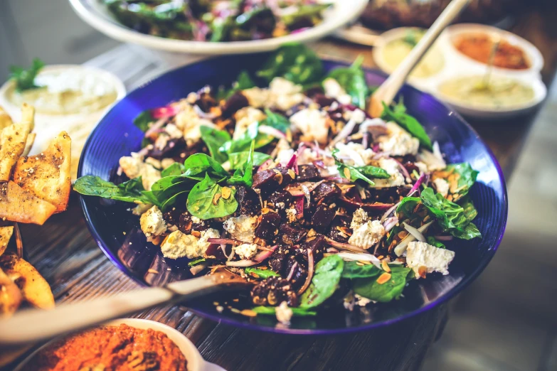 a close up of a plate of food on a table, pexels contest winner, salad, purple, 🦩🪐🐞👩🏻🦳, basil gogos