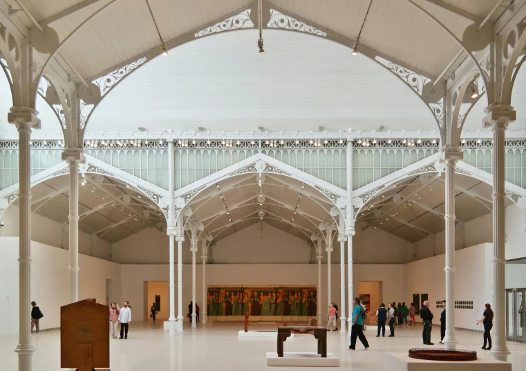 a group of people that are inside of a building, inspired by Albert Joseph Moore, art nouveau, high arched ceiling, white gallery, calm weather, steel archways