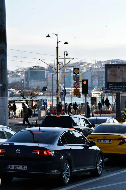 cars parked in lot area of city during sunny day