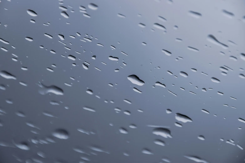 a close up of water droplets on a window, an album cover, pexels, photorealism, 3 d octane render 8 k, pbr material, gray clouds, plain background