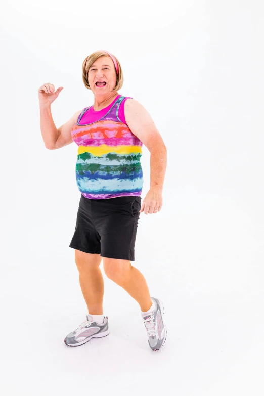 a woman holding a tennis racquet in one hand and a tennis ball in the other, inspired by Mardi Barrie, dribble, happening, wearing a tie-dye shirt, ricky berwick, wearing a tank top and shorts, julian ope