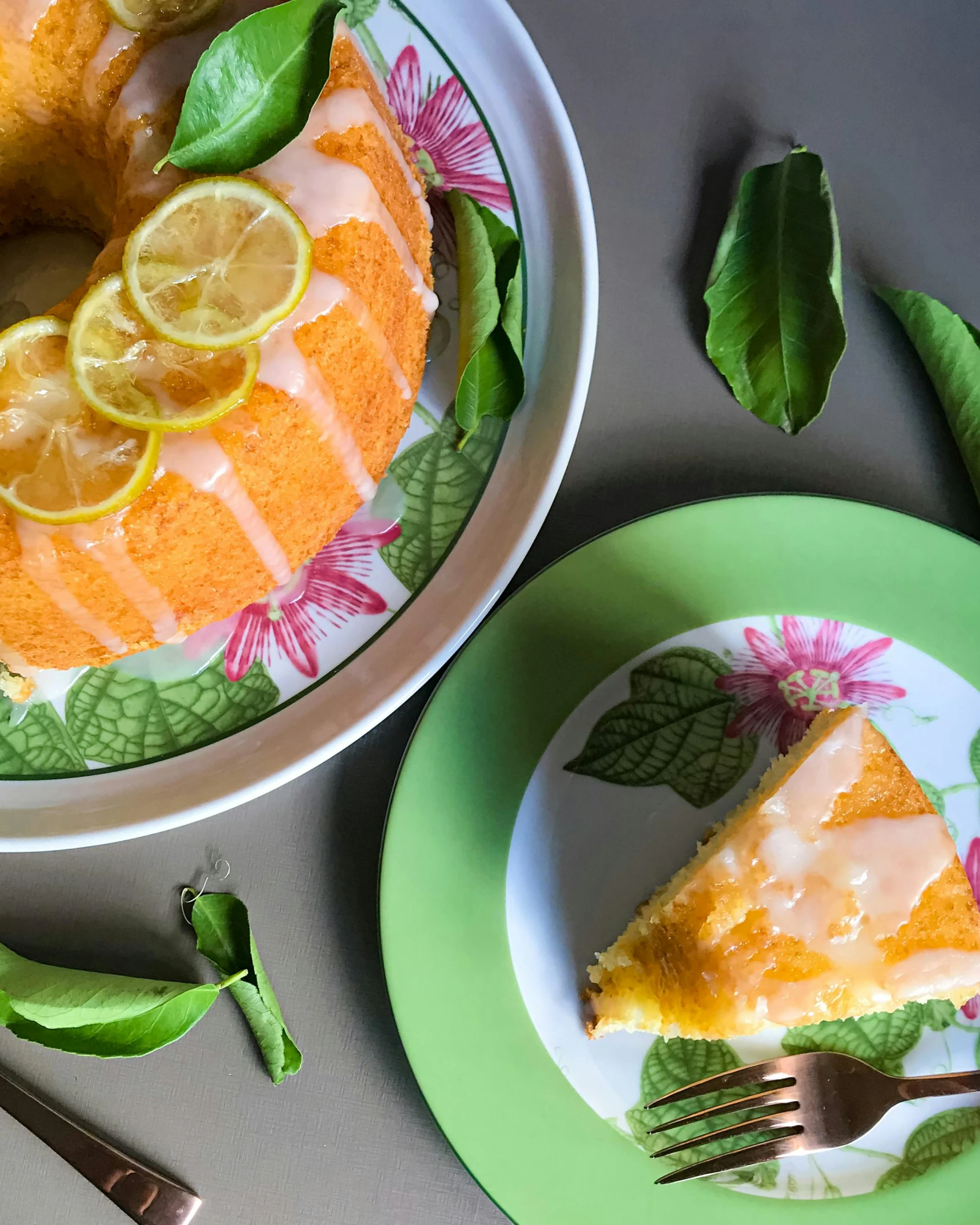 a bunt cake sitting on top of a green plate, by Carey Morris, trending on unsplash, lemonade, triumphant pose, orange, basil