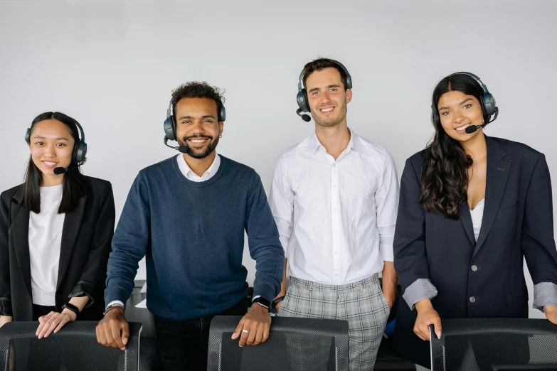 a group of people wearing headsets in a call center, a colorized photo, pexels contest winner, renaissance, office clothes, plain background, confident smirk, thumbnail