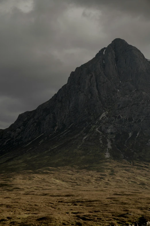 a view of the side of a mountain from the side