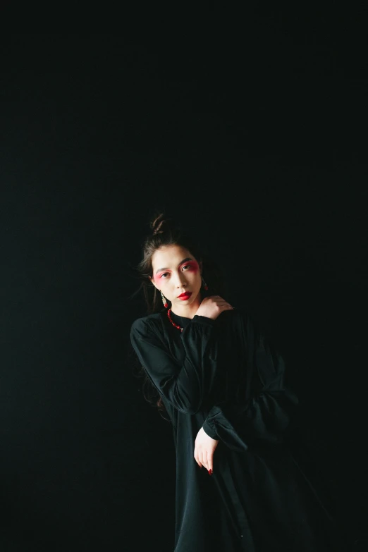 a woman in a black dress standing in the dark, an album cover, by Shang Xi, unsplash, minimalism, nezuko, wearing a black sweater, ((portrait)), nishihara isao