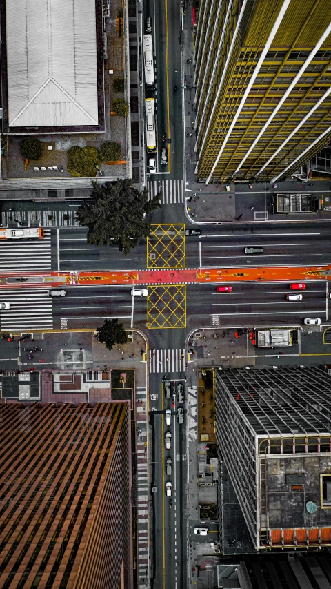 an aerial view of a busy city street, an album cover, by Tobias Stimmer, pexels contest winner, intersection, technology, orange roof, gif