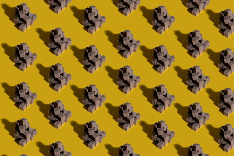 a yellow background is made up of rocks