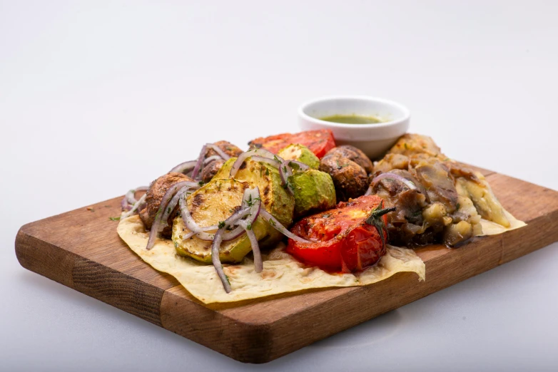 a plate of food sitting on top of a wooden cutting board, by Niko Henrichon, greek ameera al taweel, medium angle, various posed, kebab