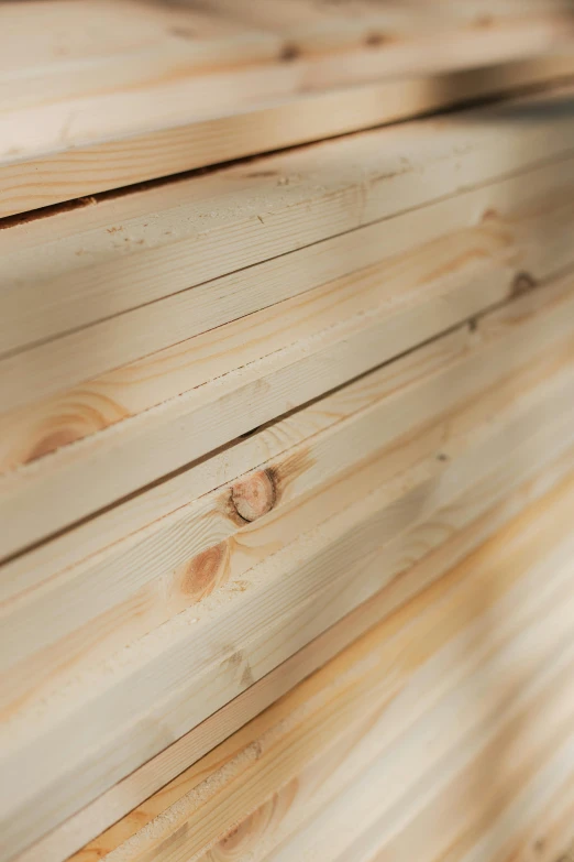 a stack of pine boards stacked on top of each other, detailed product image, detail shot, caparisons, medium closeup