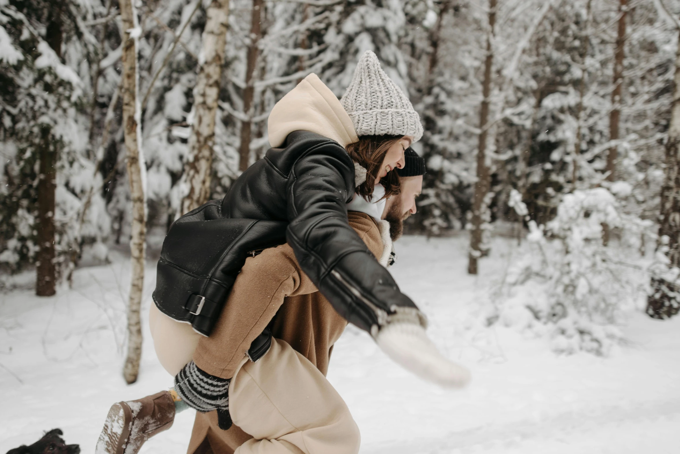 a person is riding skis on a snowy surface