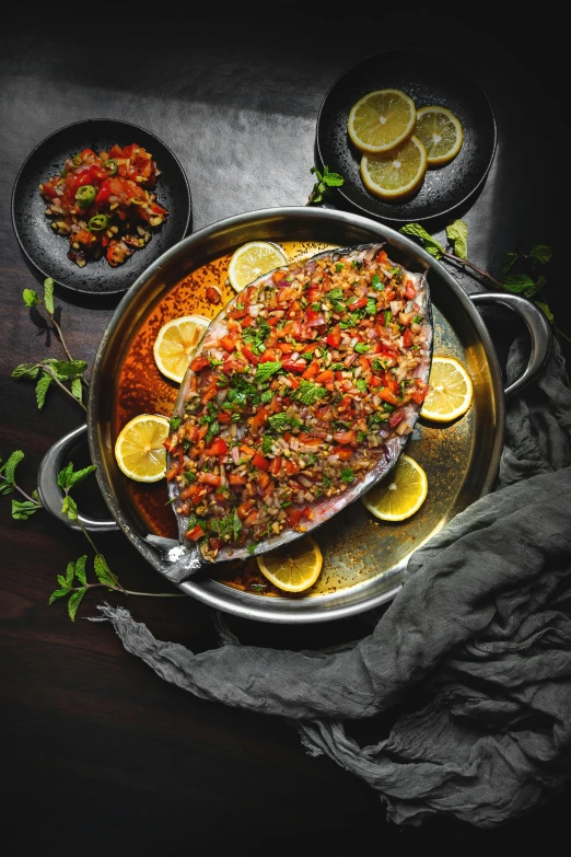 a pan filled with fish sitting on top of a table, during the night, full body image, product shot, middle eastern