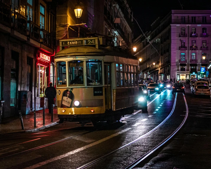 a trolley on a city street at night, by Tom Wänerstrand, pexels contest winner, renaissance, lisbon city at night, slide show, square, header text”