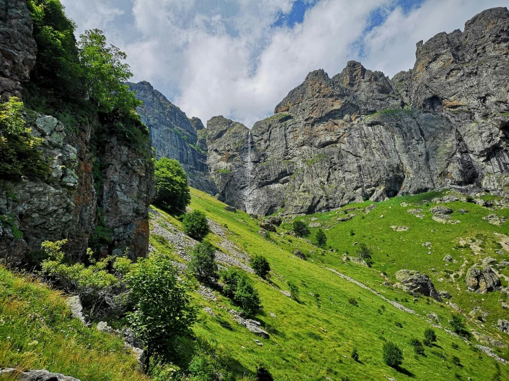 the grass and stone hills are very green