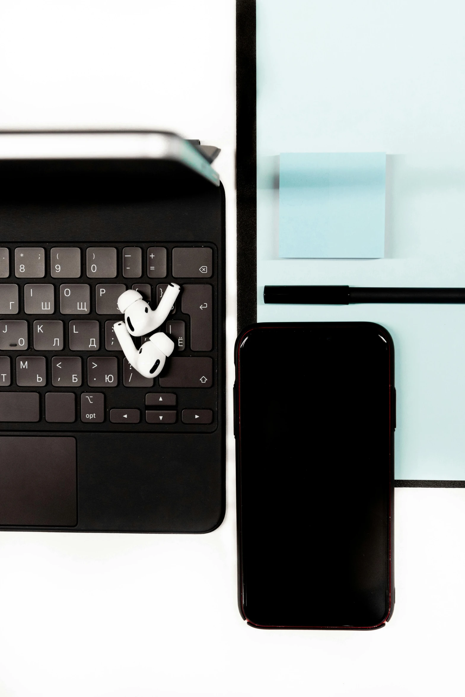 a laptop computer sitting on top of a desk next to a cell phone, by Carey Morris, trending on pexels, computer art, knolling, minimalist sticker, my computer icon, highcontrast