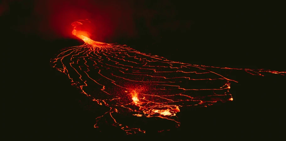 the lava in the dark has very many glowing spots