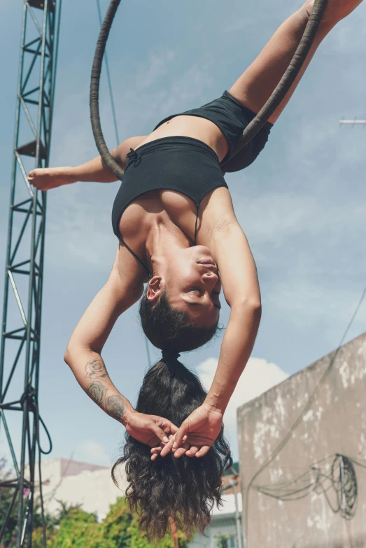 an image of a man performing aerial acrobatic tricks