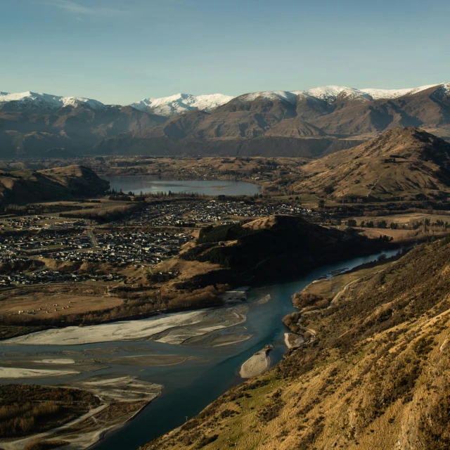 a view from a mountain looking down at the water