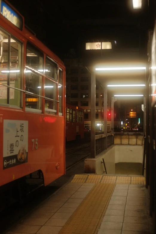 a train stopped in a tunnel for people to get on