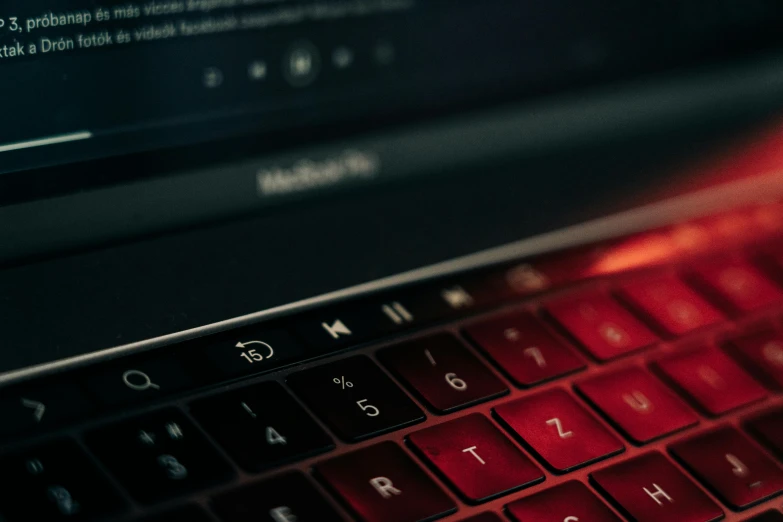 a close up of a red keyboard on a laptop, a computer rendering, by Adam Marczyński, pexels, cinematic accent lighting, avatar image, my computer icon