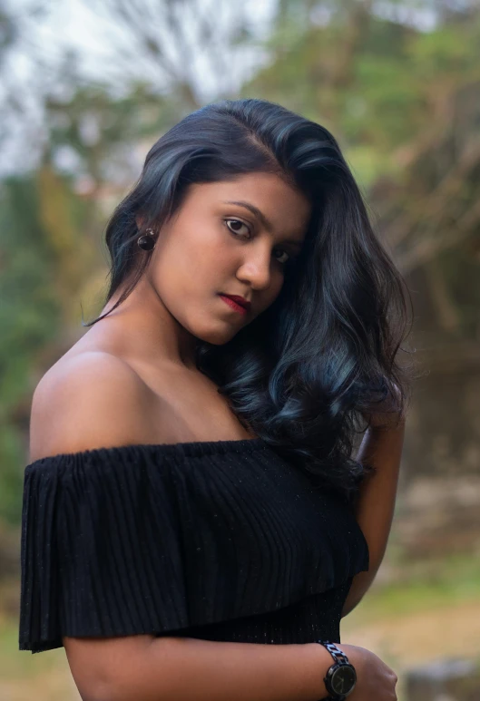 a woman in a black dress posing for a picture, by Max Dauthendey, pexels contest winner, indian girl with brown skin, square, profile image, half body photo