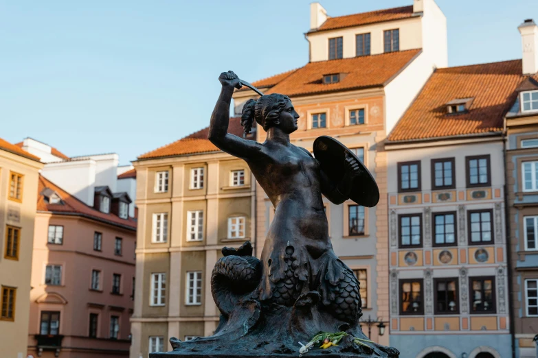 a statue in the middle of a city square, by Adam Marczyński, pexels contest winner, art nouveau, kara walker, square, fan favorite, lamia