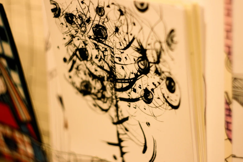 a close up of a book with drawings on it, an ink drawing, inspired by Pollock, neurons and synapses, documentary photo, ilustration, borne space library artwork