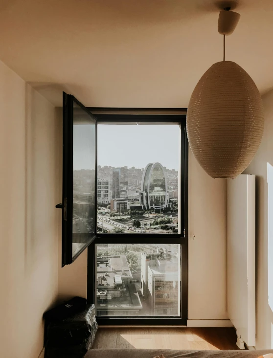 a living room with open floor plans that is a modern apartment building