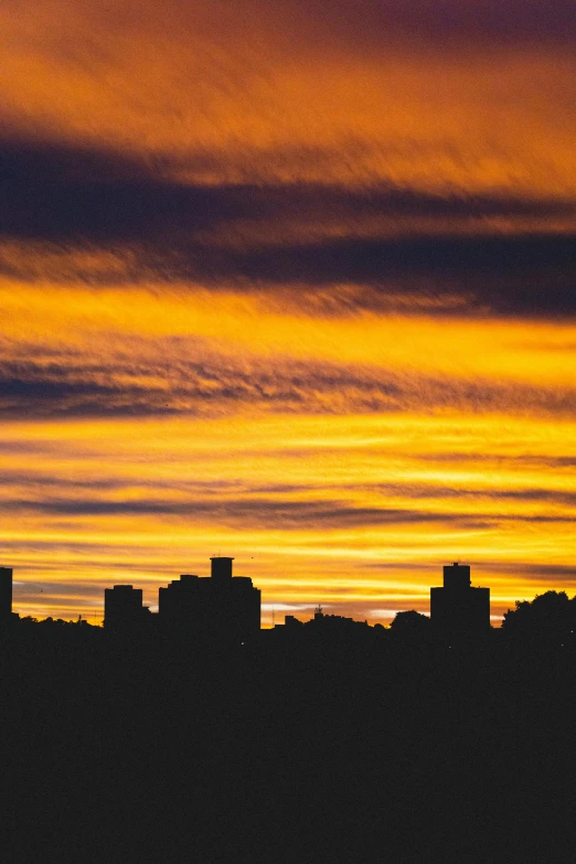 a view of the skyline with some dark clouds