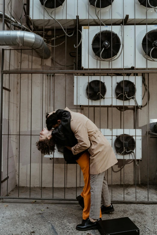 a woman standing in front of a bunch of air conditioners, a photo, pexels contest winner, couple kissing, couple dancing, brutalist style, transparent background