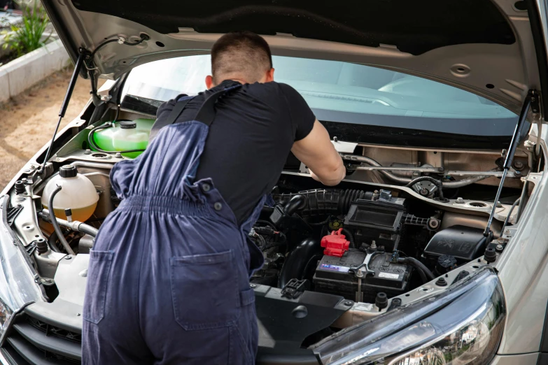 a man in overalls looking under the hood of a car, profile image, maintenance photo, instagram photo, 15081959 21121991 01012000 4k