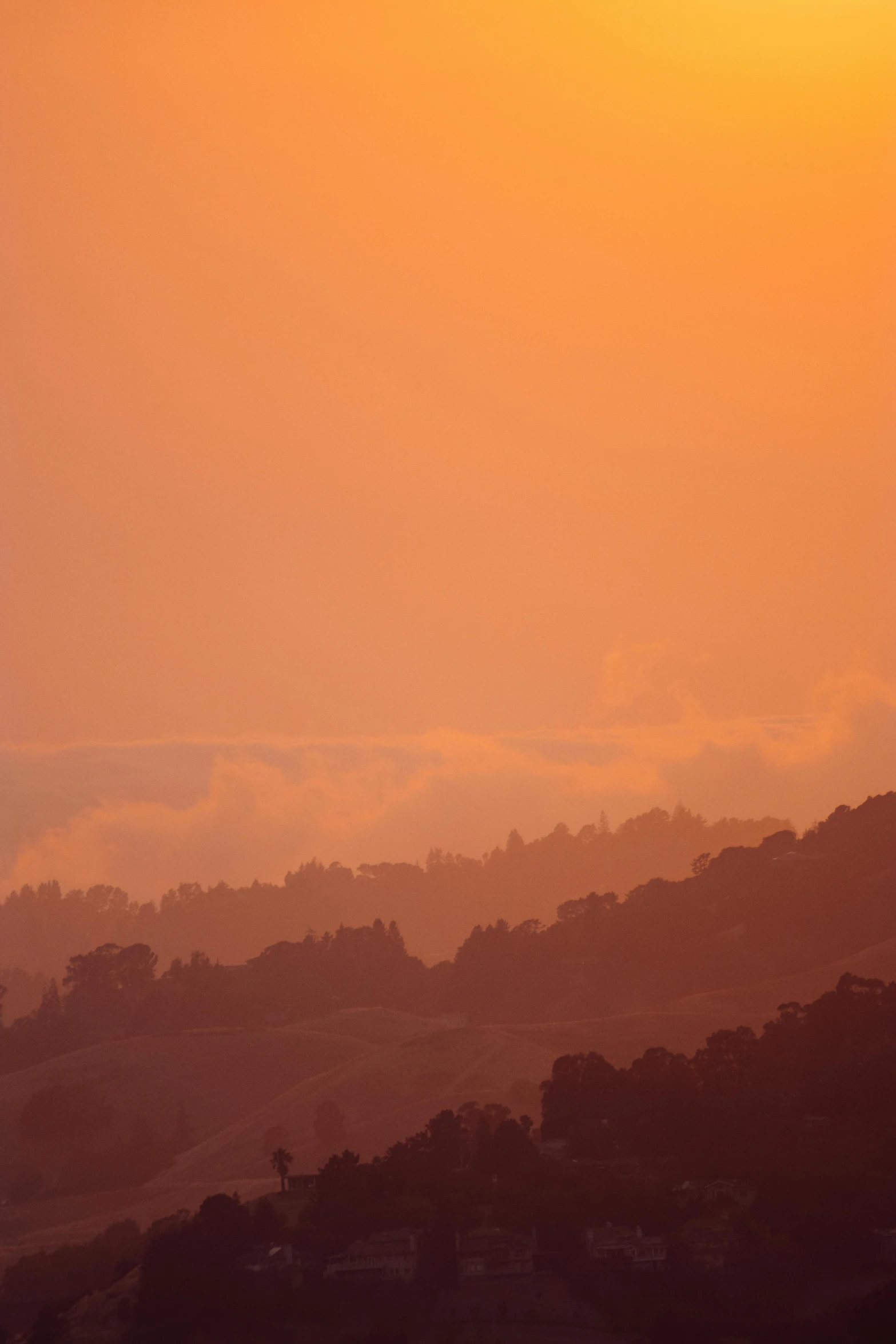 a large jetliner flying over a lush green hillside, by Peter Churcher, tonalism, light orange mist, sf, silhouetted, do